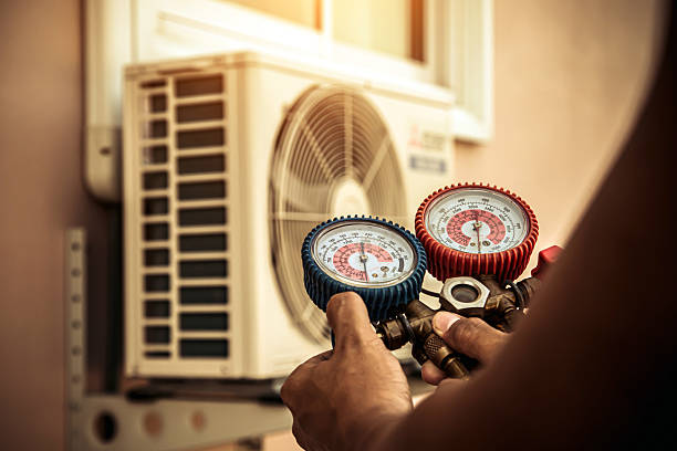 Professional Hvac technician working in Twin City, GA
